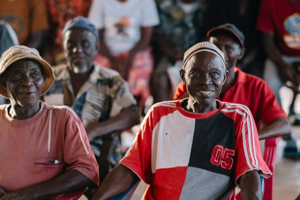 Older adults gathered and smiling together