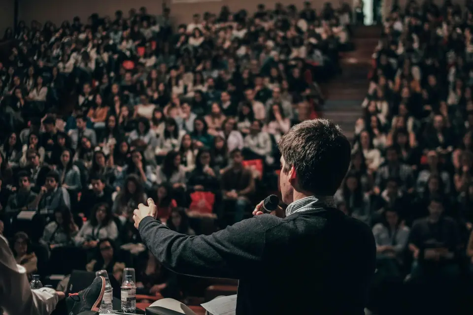 Man speaking to a crowd