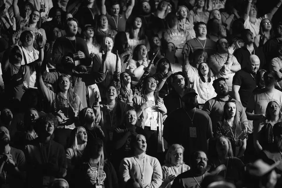 Large group of people seated in a room
