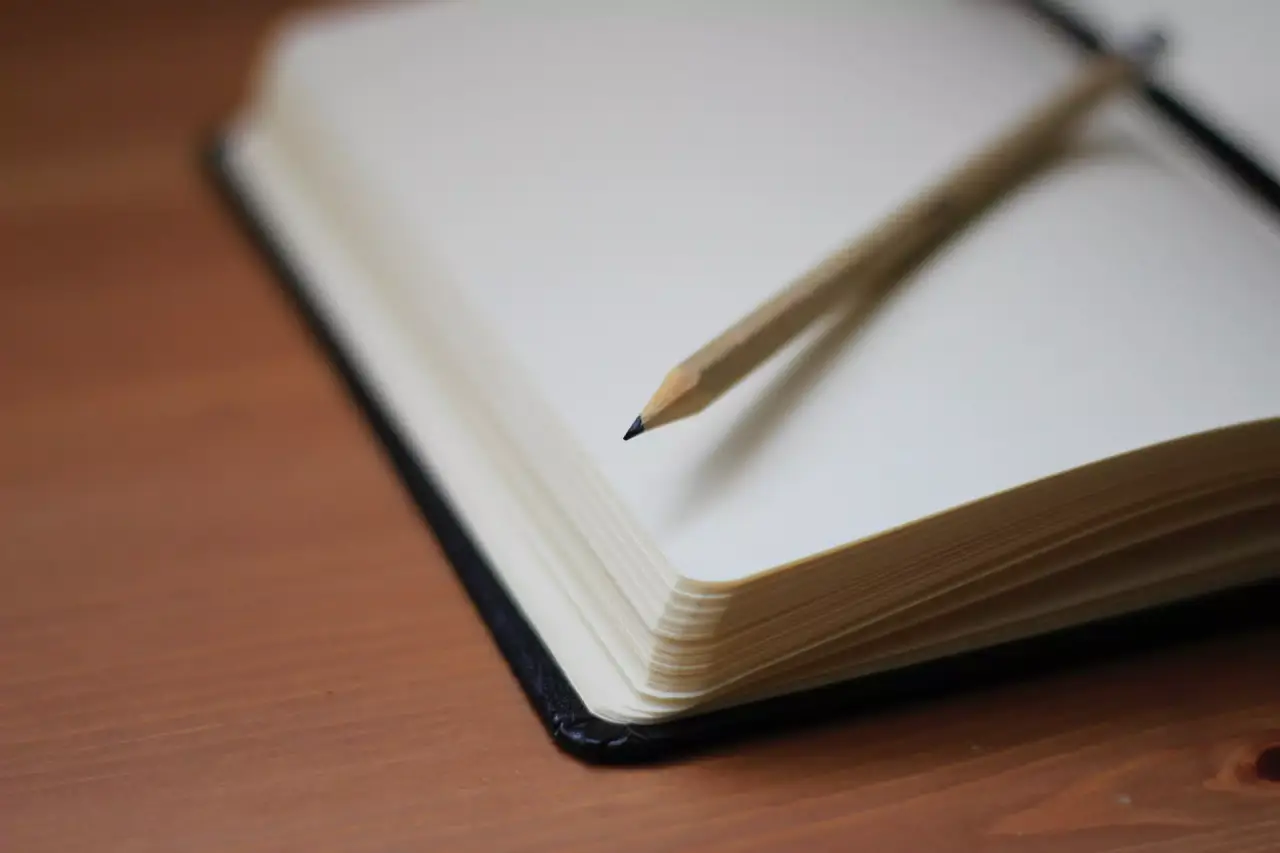Buch mit einem Stift