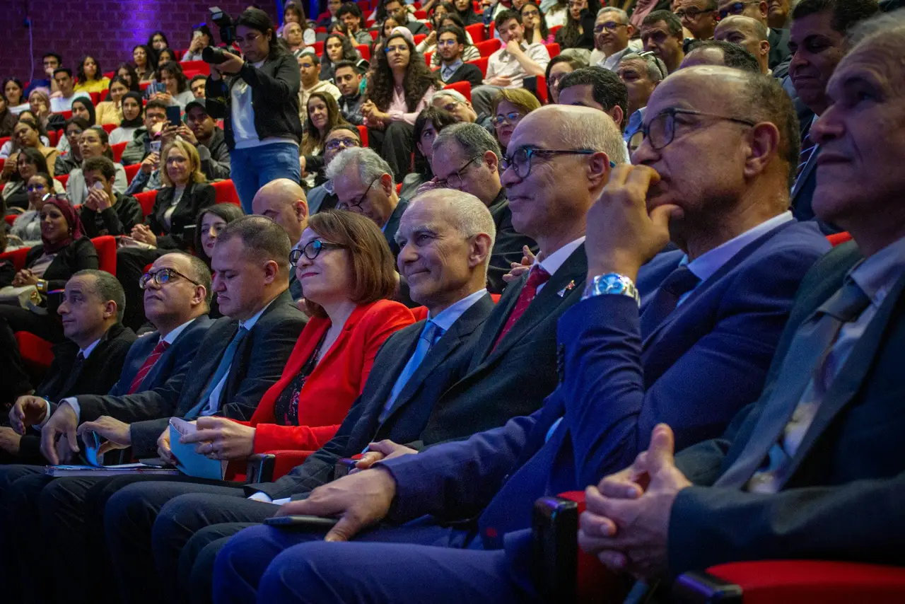 Association members attending a conference presentation.