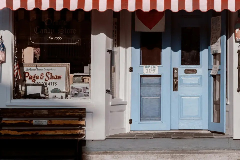 White and red storefront of a local shop