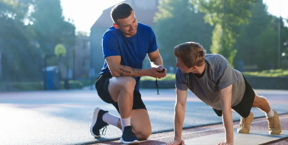 Trainer mit Vereinsmitglied