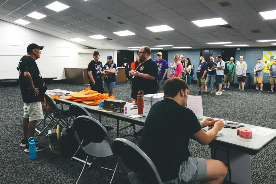 People gathered in a large event room