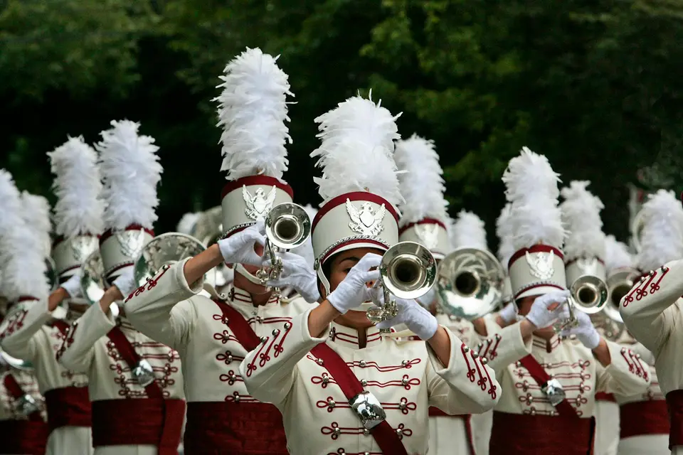 A marching band performing in uniform.